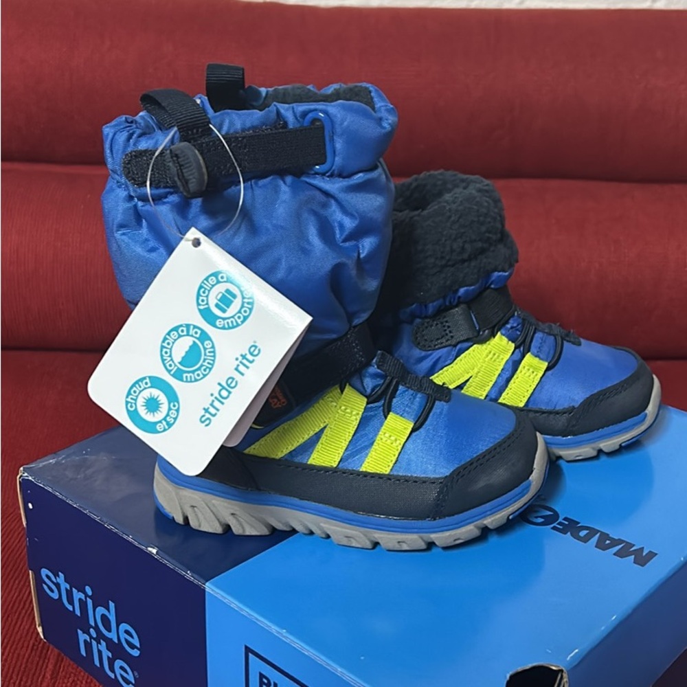 Brand new strike ride winter boots, blue size 6 1/2 toddler